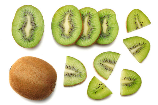 istock Slices kiwi fruit isolated on white background top view 903034418