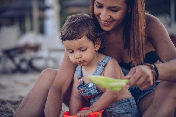 istock Mother playing with cute daughter 903035006