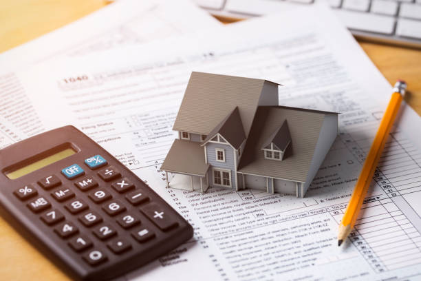 home tax deduction mortgage interest - 1040 tax form imagens e fotografias de stock