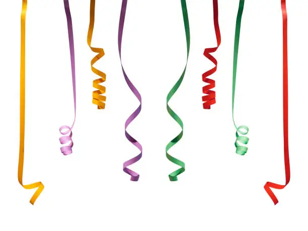 Photo of Colorful Paper Streamers isolated on White Background.