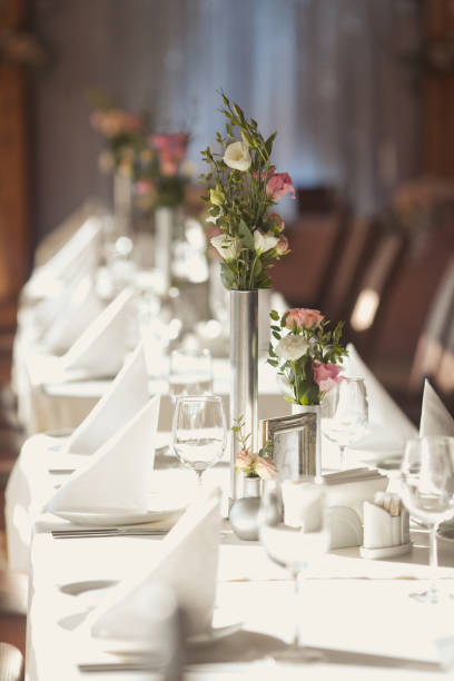 istock Luxury wedding setting table in white colors with number for guests 903036428