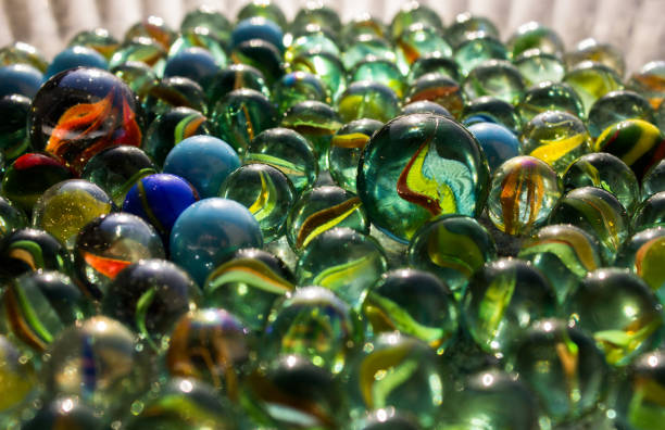 istock collection of colored glass marbles 903040838
