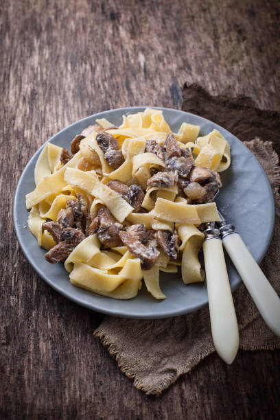 istock Pasta tagliatelle  with  mushrooms 903049504