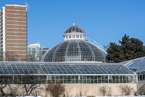 Allan Gardens greenhouse and horticulture building on a cool clear blue sky winter day