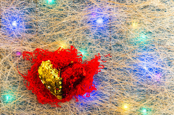 Broken heart. A heart that suffers. Multicolored garland