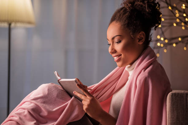istock Joyful young woman creating poem with inspiration 903065374