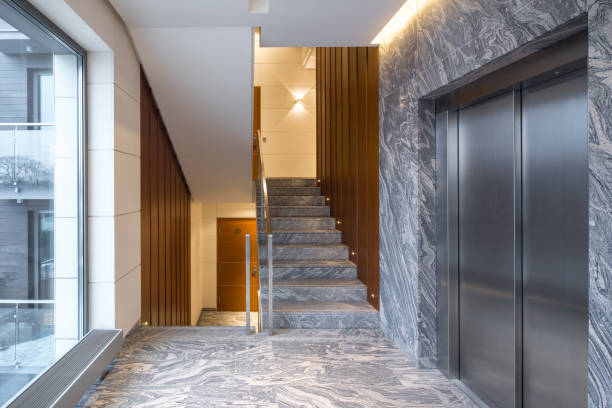 istock Hall staircase and elevator in a modern block of flats. 903070106