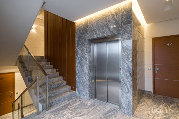 istock Hall staircase and elevator in a modern block of flats. 903070128