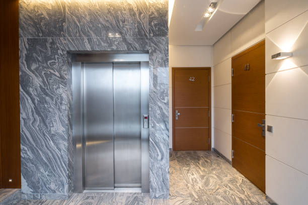 istock Hall staircase and elevator in a modern block of flats. 903070134