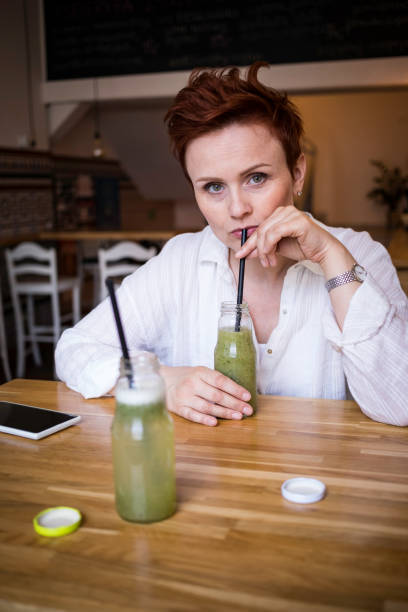 istock woman in a veggie restaurant 903073906