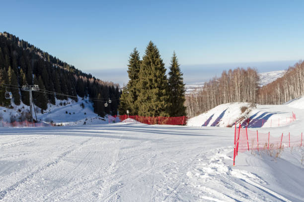 istock at the bifurcation of the ski slopes 903077726