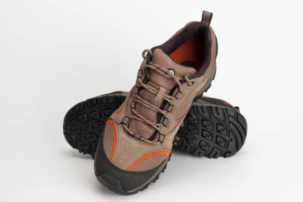 Outdoors shoes for man for hiking, trekking, climbing and walking, studio shoot on white background