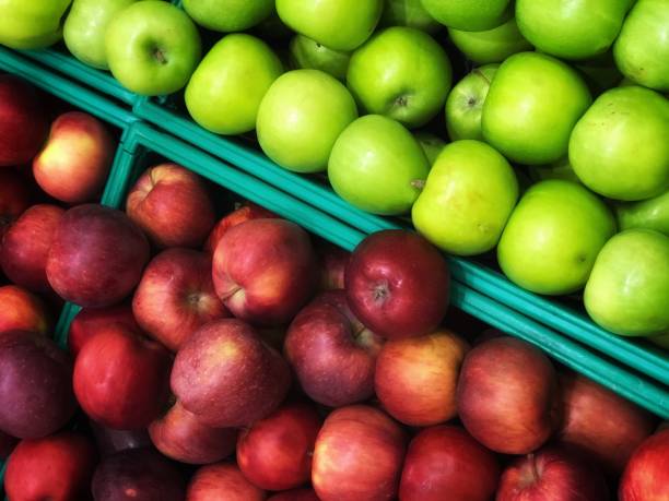 Red and green apples background