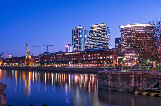 istock High buildings in city at night 903105092