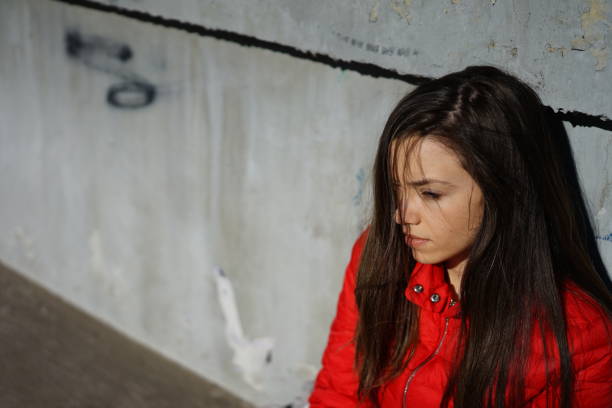 istock Woman With Long Hair Against Wall 903105094