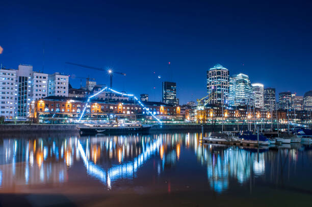 istock High buildings in city at night 903107684