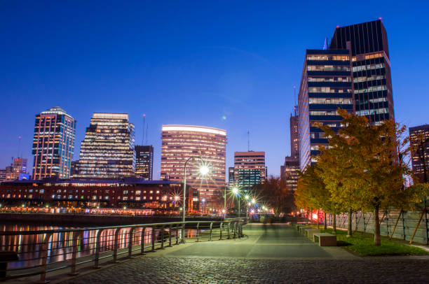istock High buildings in city at night 903107690