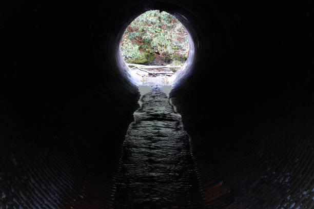 istock Deep Mysterious Drainage Pipe of the Mountains 903107954