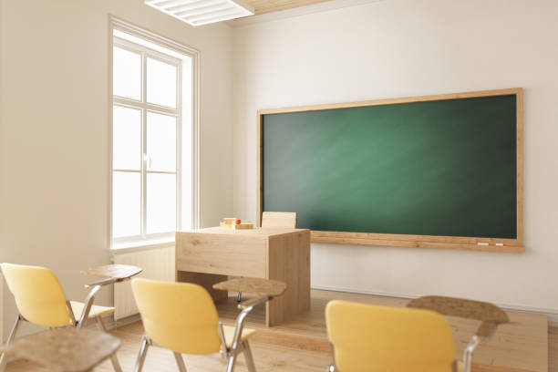 istock Teacher's Table and the Blackboard with Selective Focus 903115504