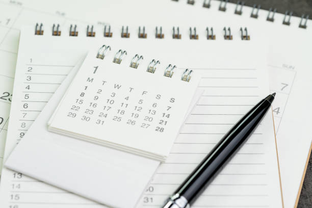 istock Calendar planner page on notebook list with a pen using as reminder or year plan appointment 903116068