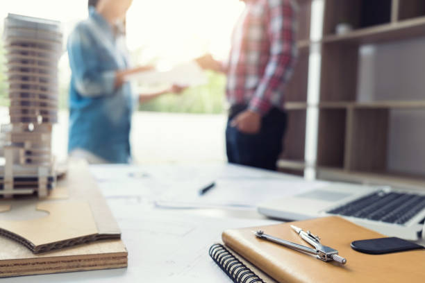 istock Architecture Engineer Teamwork Meeting, Drawing and working for architectural project and engineering tools on workplace, concept of work on technical drawings 903119226