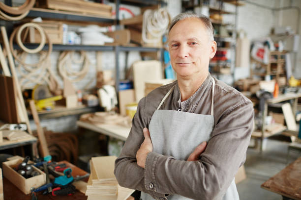 istock Smiling skilled carpenter confident in himself 903121460