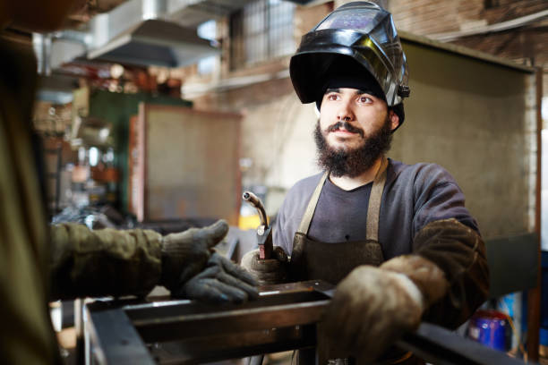istock Coworkers discussing metal construction 903128190