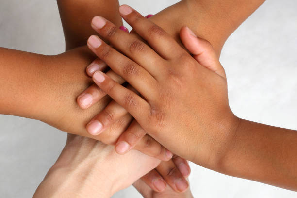 istock hand people stacked on top of each other 903128524