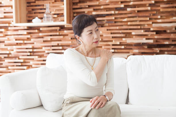 istock A woman with a sore shoulder. 903134180