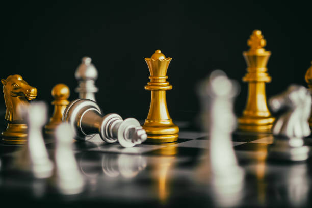istock Strategy chess battle Intelligence challenge game on chessboard. Success the strategy concept. Chess business leader and success idea. Chess strategy game business competition success play. 903134304