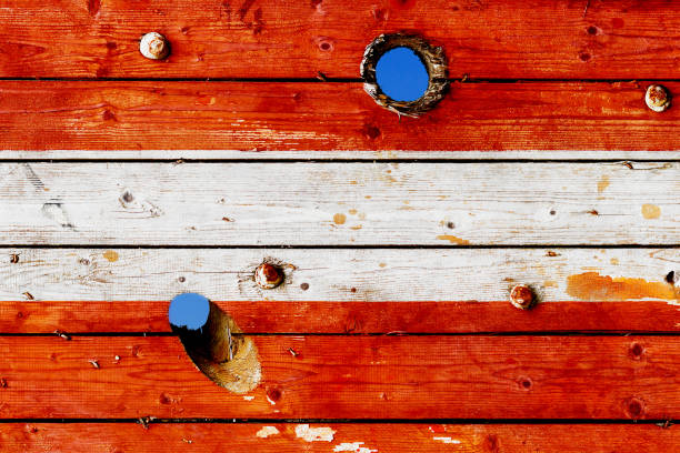 Austrian flag painted on old weathered boards