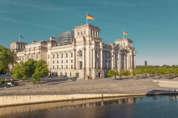 istock River By The Reichstag Against Blue Sky 903164018