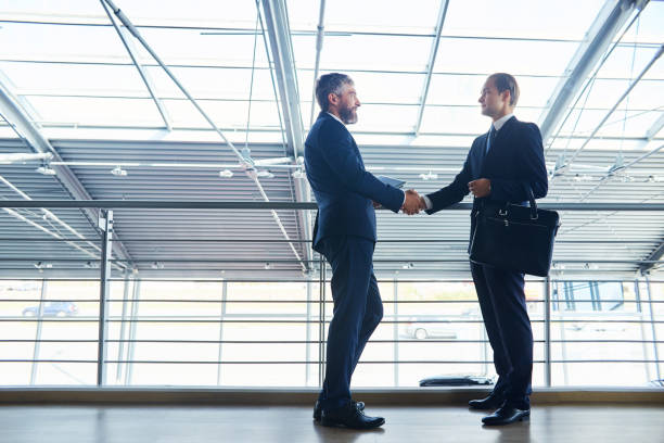 istock Successful businessmen greeting each other 903165574