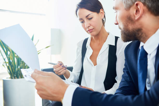istock Sales manager showing agreement to customer 903165606