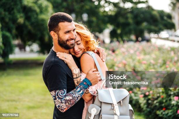 Cute Couple In Summer Park Stock Photo - Download Image Now - Couple - Relationship, Falling in Love, Love - Emotion