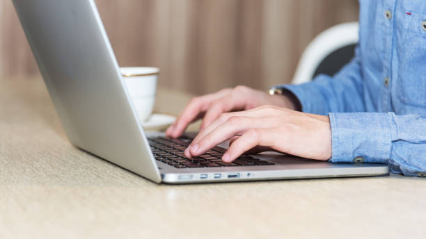 istock Businessman sitting in office, working with laptop computer. Business concept. 903179140