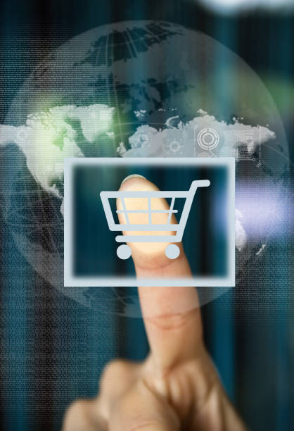 Shopping at the online store. Shopping cart icon. E-commerce. stock photo