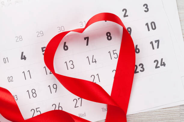 istock Valentines day greeting card and heart shaped ribbon 903187112