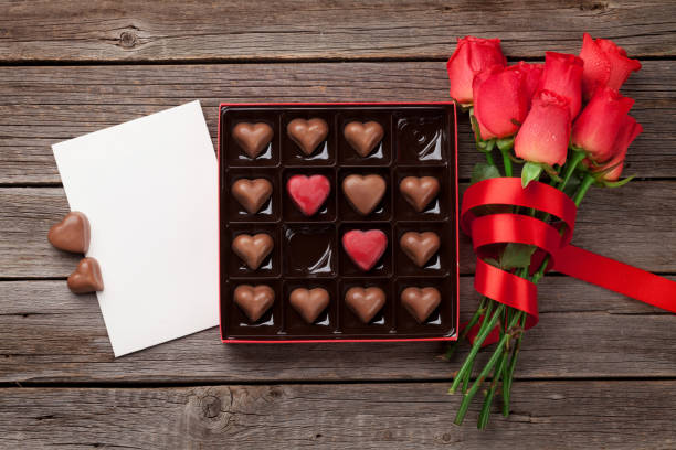 istock Valentines day with red roses and chocolate 903190812