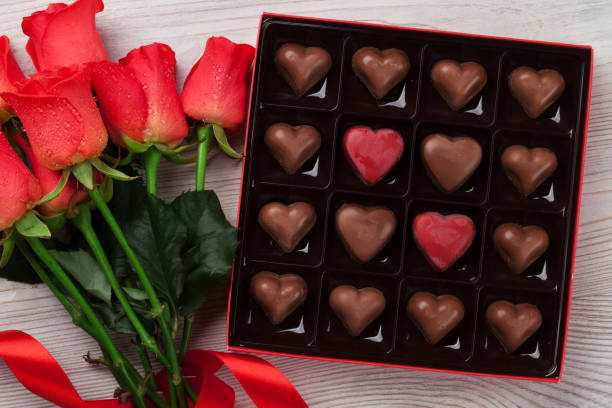 istock Valentines day with red roses and chocolate 903190834