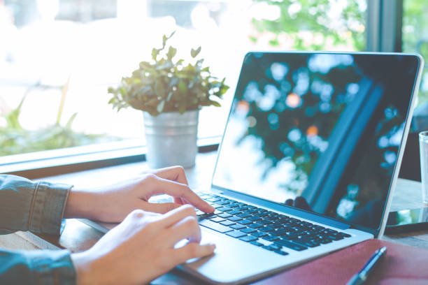 istock Woman's hand working on laptop in the office. 903198782