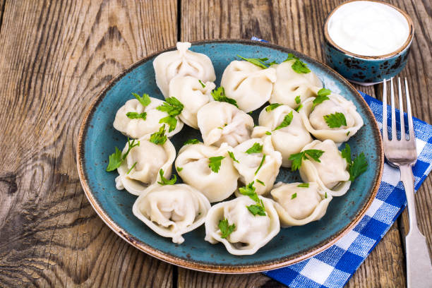 istock Russian cuisine. Homemade dumplings stuffed meat 903202846