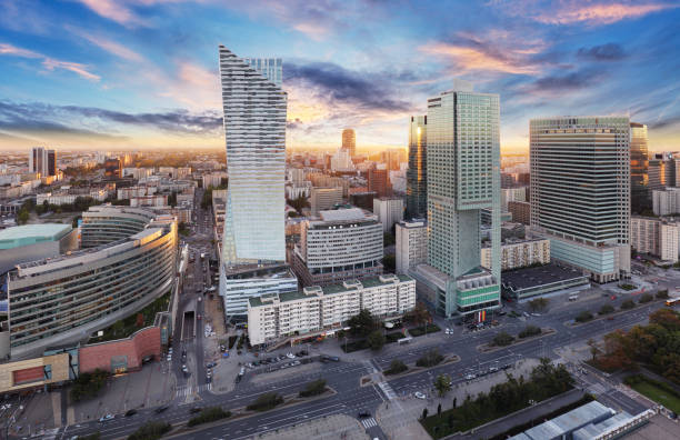 istock Warsaw city with modern skyscraper at sunset, Poland 903207320