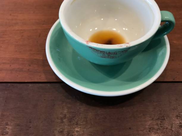 istock finished cup of hot coffee with red lipstick mark 903210854