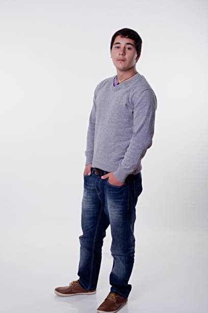 istock Cool Teenage Boy Standing, Arms Crossed 903213948