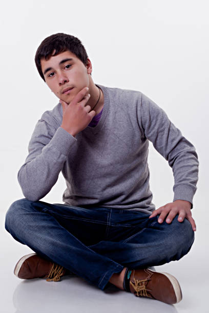 istock Cool Teenage Boy posing over whitebackground 903214352