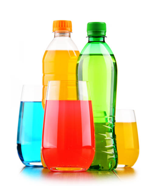 istock Glasses and bottles of assorted carbonated soft drinks 903221296