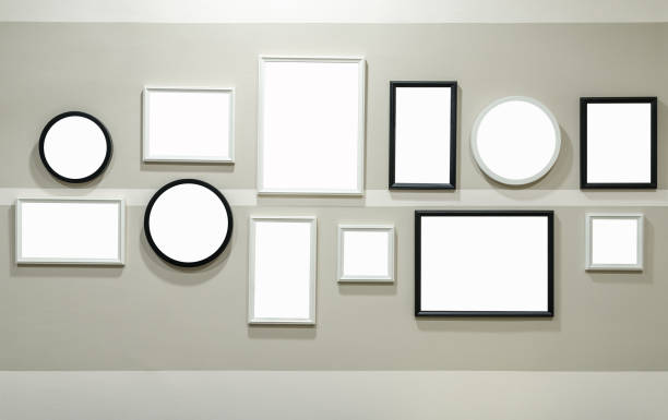 istock Different size of black and white photo frame on wall 903221306