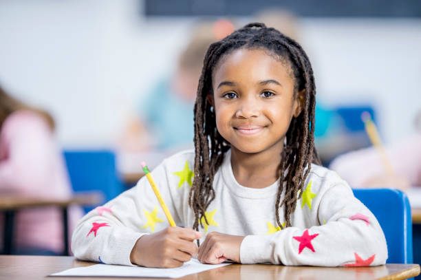 istock Happy Girl In Classroom 903229010