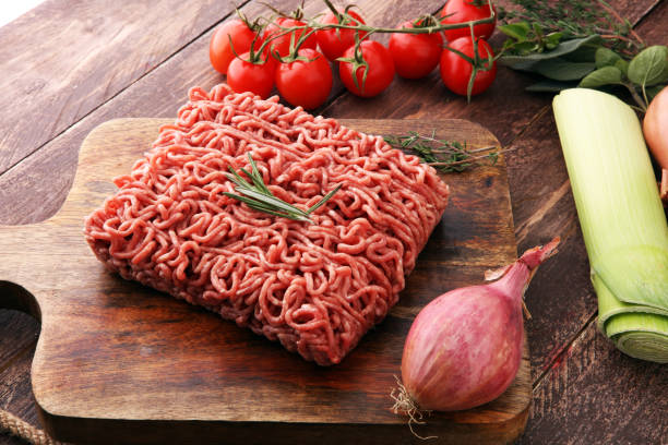 istock Raw pork and beef ground meat and vegetables. 903229062